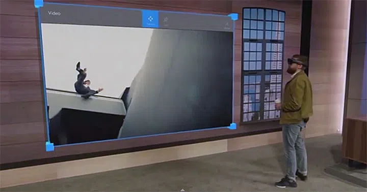Holograms are basically Windows 10 universal apps, so you can resize them.
