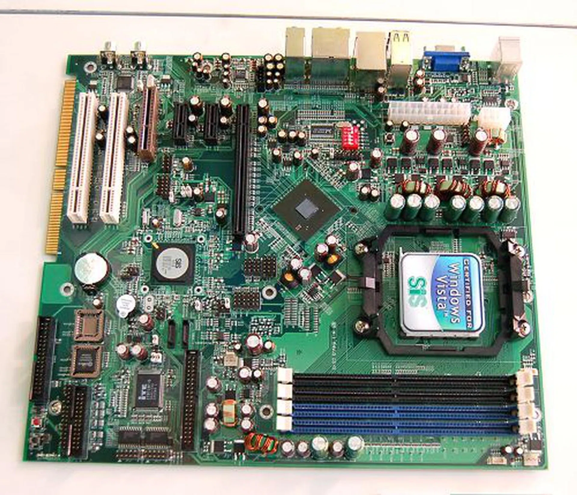  There's also an AMD platform equivalent with the SiS 771 chipset and the reference board has been in its final state for sometime now, but as SiS explained, its tough to get partners to hop on to this platform with AMD having ATI in its pocket. They had a SiS 771 reference board set up for demo as well and it was running perfectly without any form of chipset cooling; not even a heatsink! SiS has been known to produce very low power efficient chipsets and they are still upholding this tradition.  