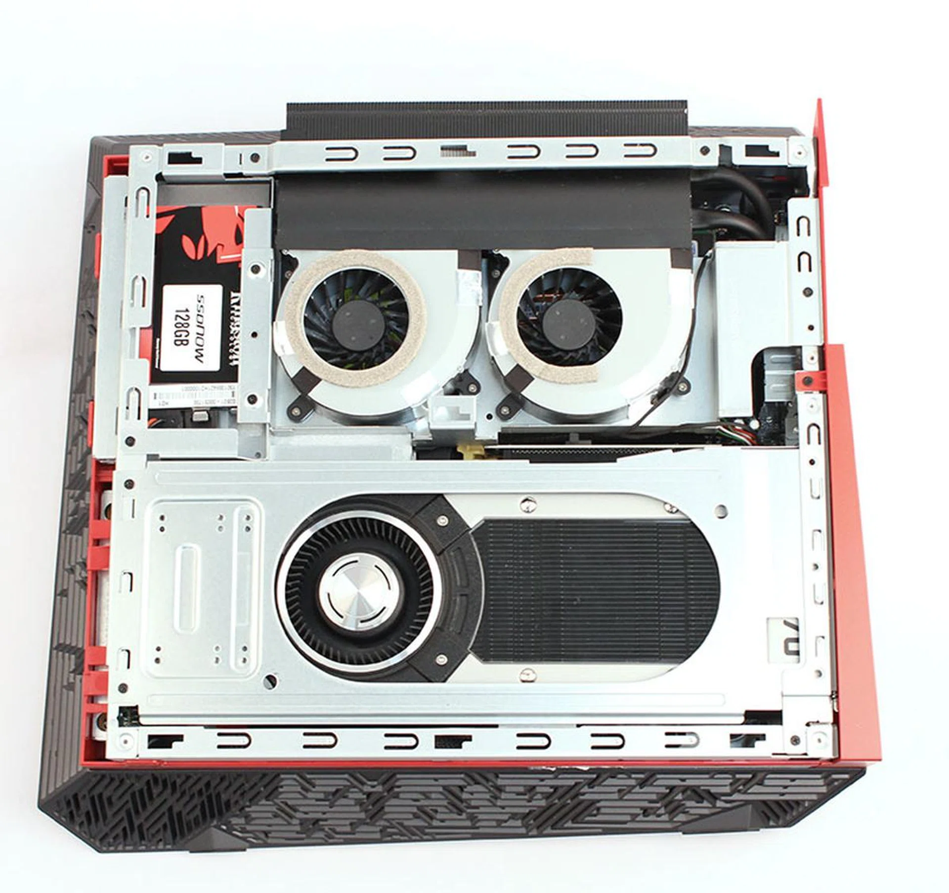 After removing screws at the top and bottom of the case, the right panel of the ASUS ROG G20 can be removed to reveal its internals.