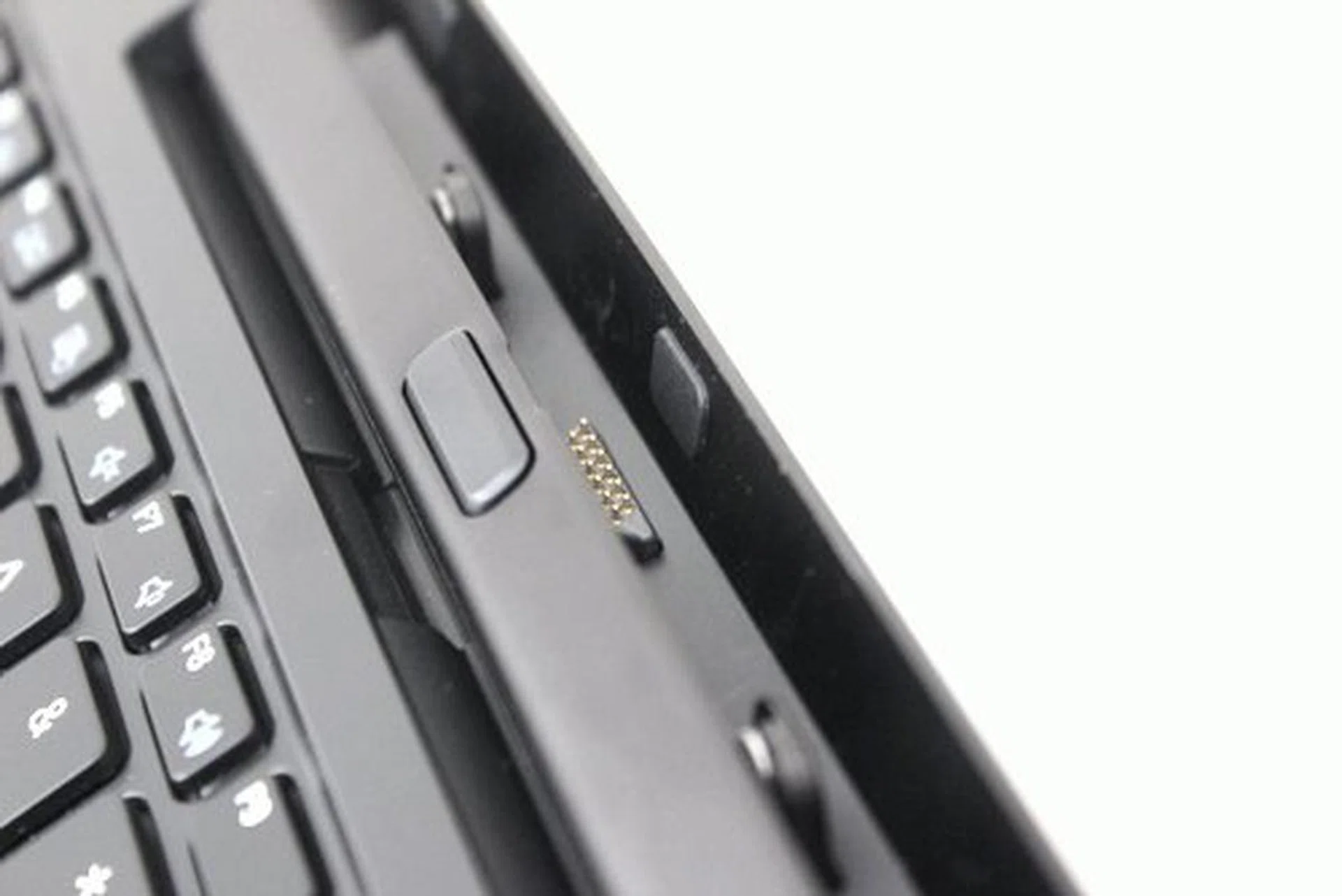 The tablet is guided into the dock by magnets so putting the tablet in and out of the dock is smooth and secure. 