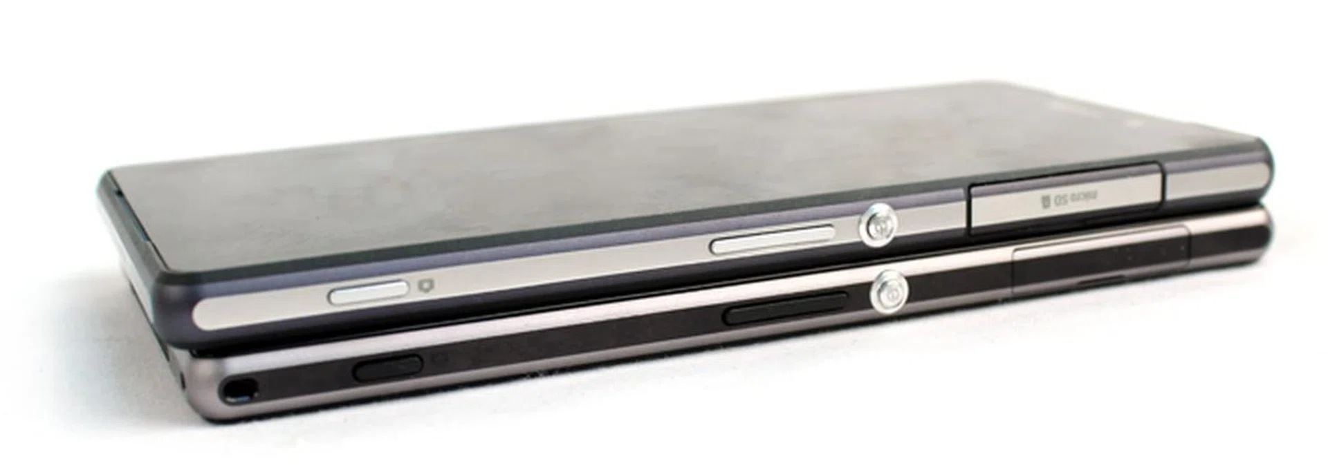 The camera shutter button is a bit longer, and the lanyard hole is now on the left side.