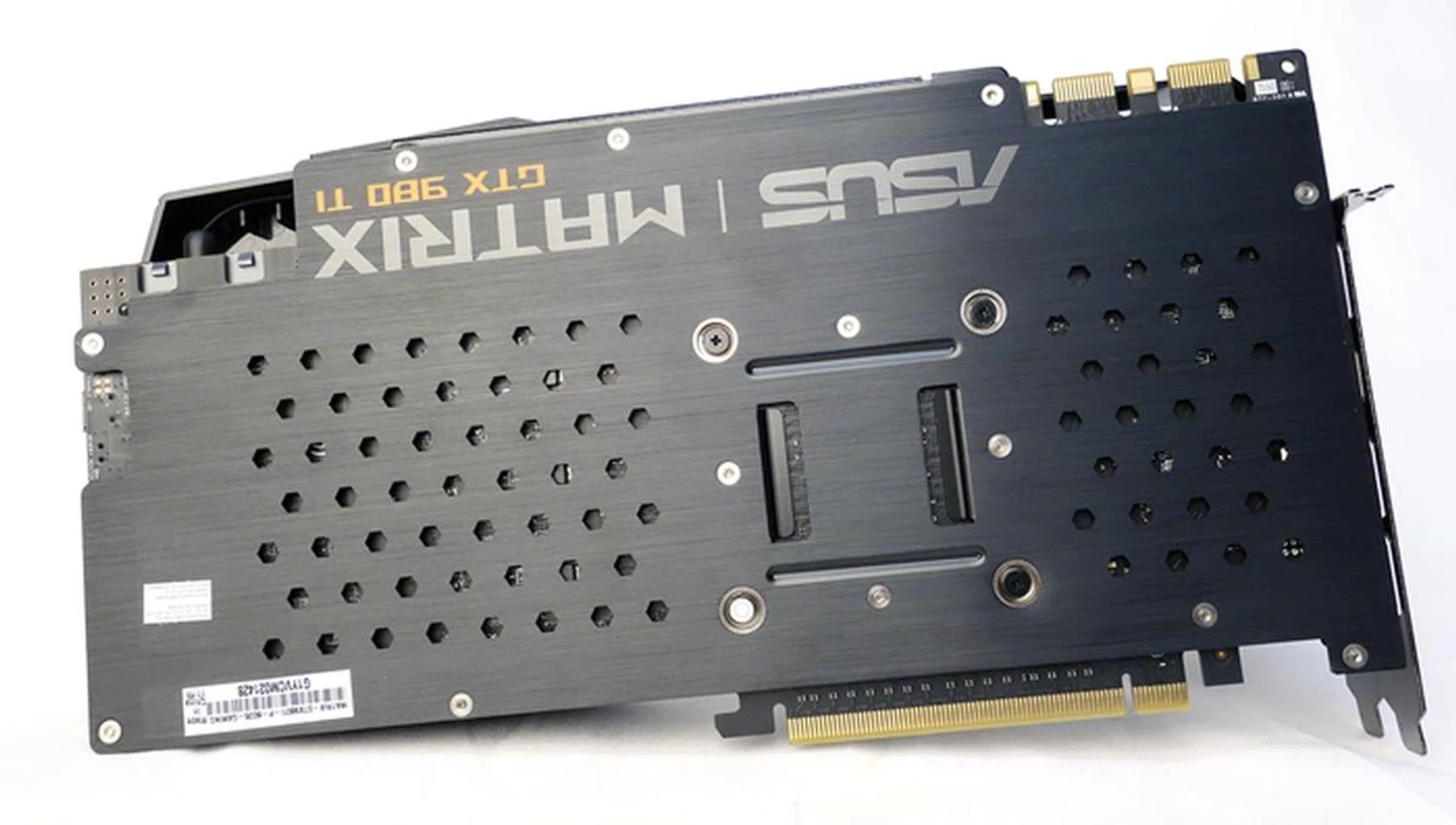 The decorative backplate of the ASUS card provides protection for the rear PCB as well as heat dissipation for its components.