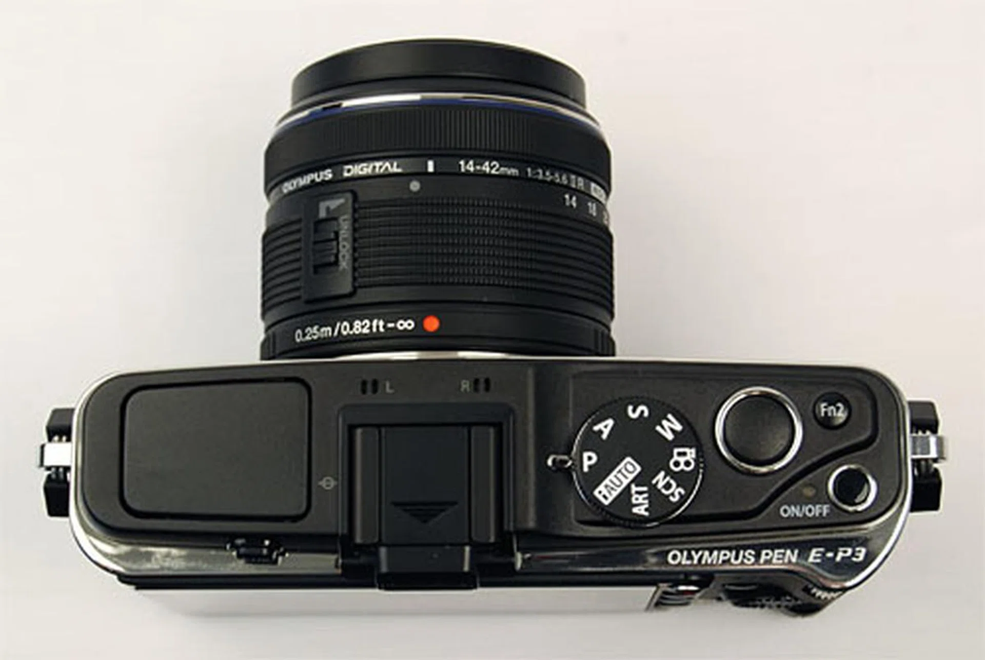 Even though a flash has been added, there's been no compromise on the number of controls on the top plate. Where the exposure button was, there's now a customizable Function button.