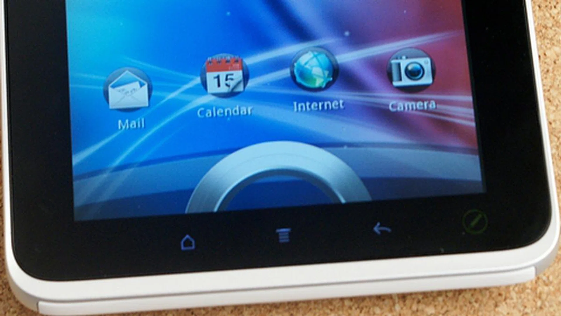 The row of virtual buttons light up whenever you unlock the screen. Pictured here is the row of virtual buttons in portrait mode.