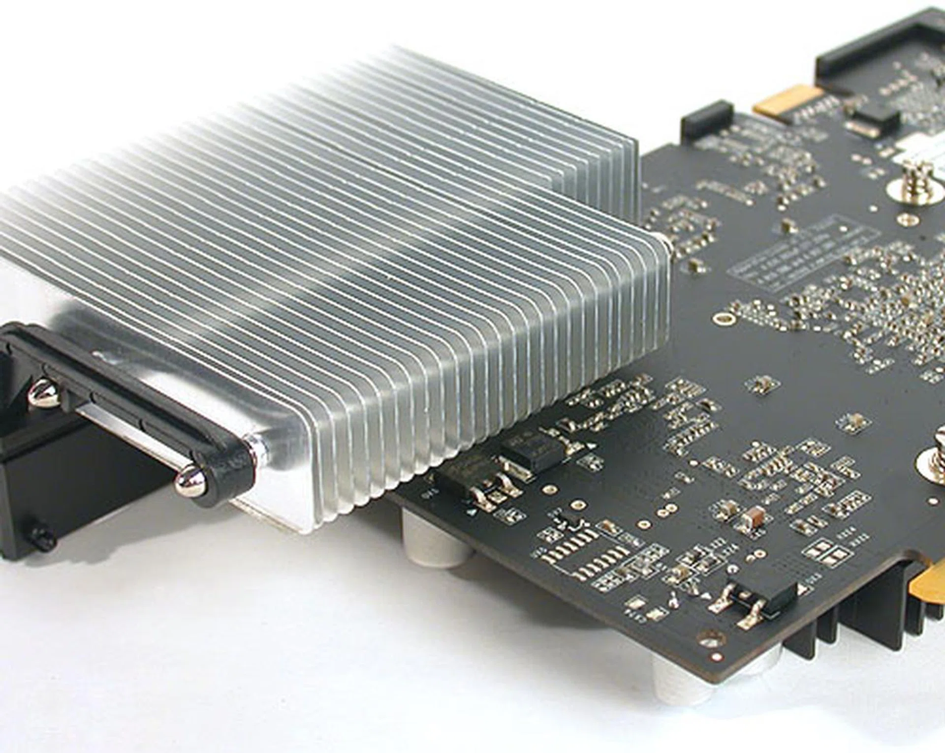 The cooling fins are placed at an elevated position such that it won't interfere with any components on the motherboard. It probably helps with the heat dissipation also by having it at such a height.