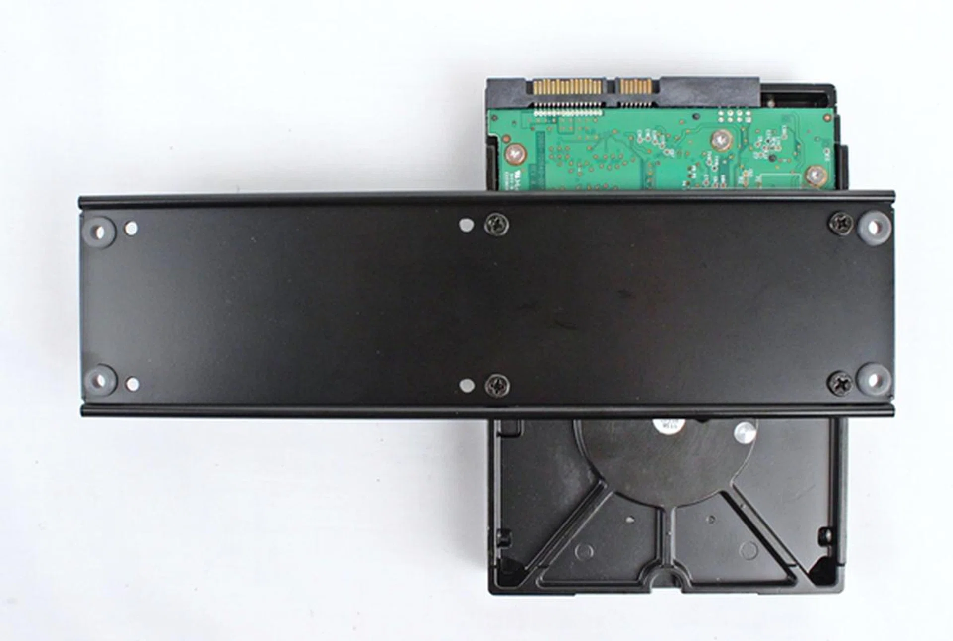 We had to secure the 3.5-inch HDD to the drive bracket before mounting the bracket within the chassis.