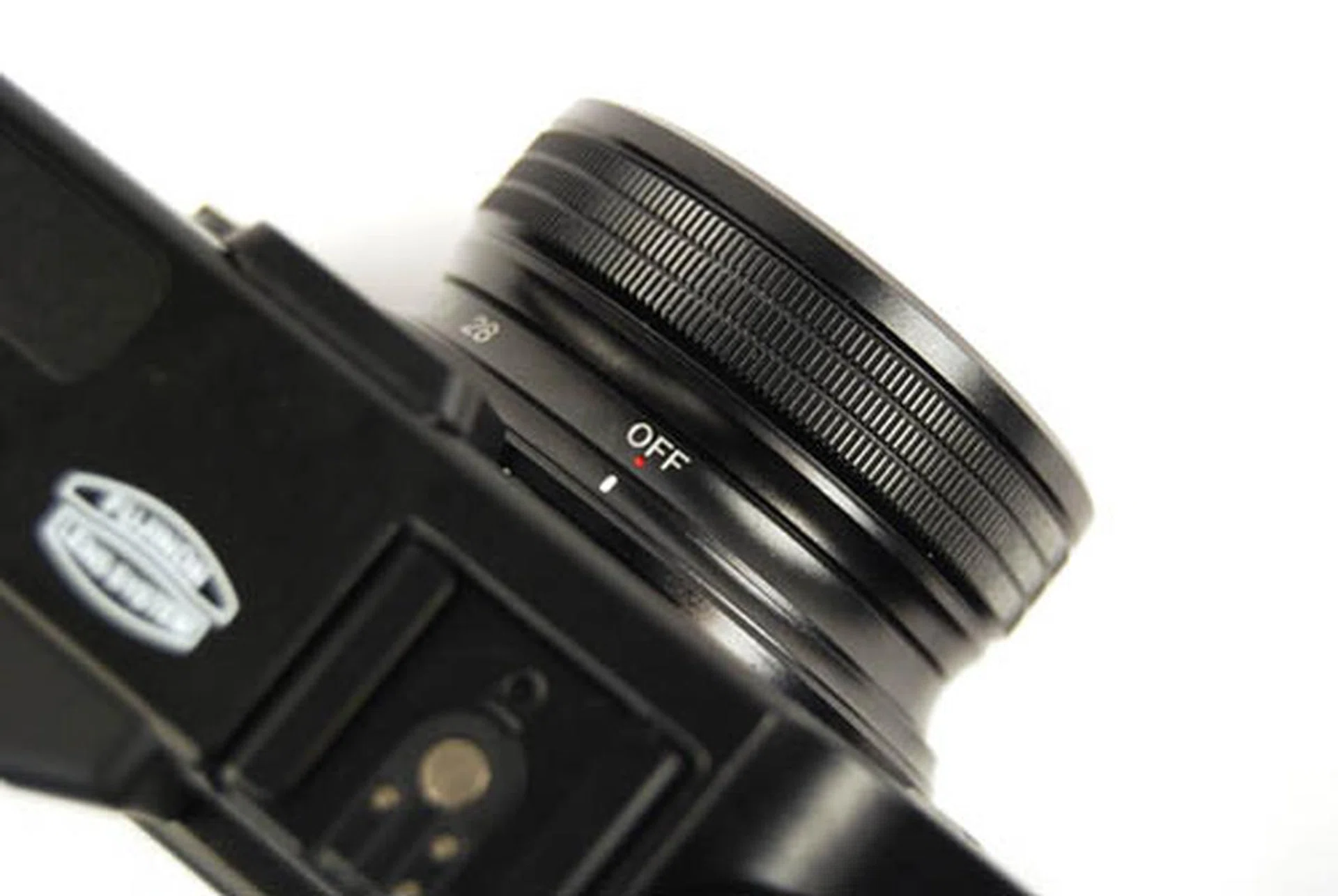 Instead of a Power button, twisting the lens switches the X10 on; you can be powered on and shooting in one smooth move.