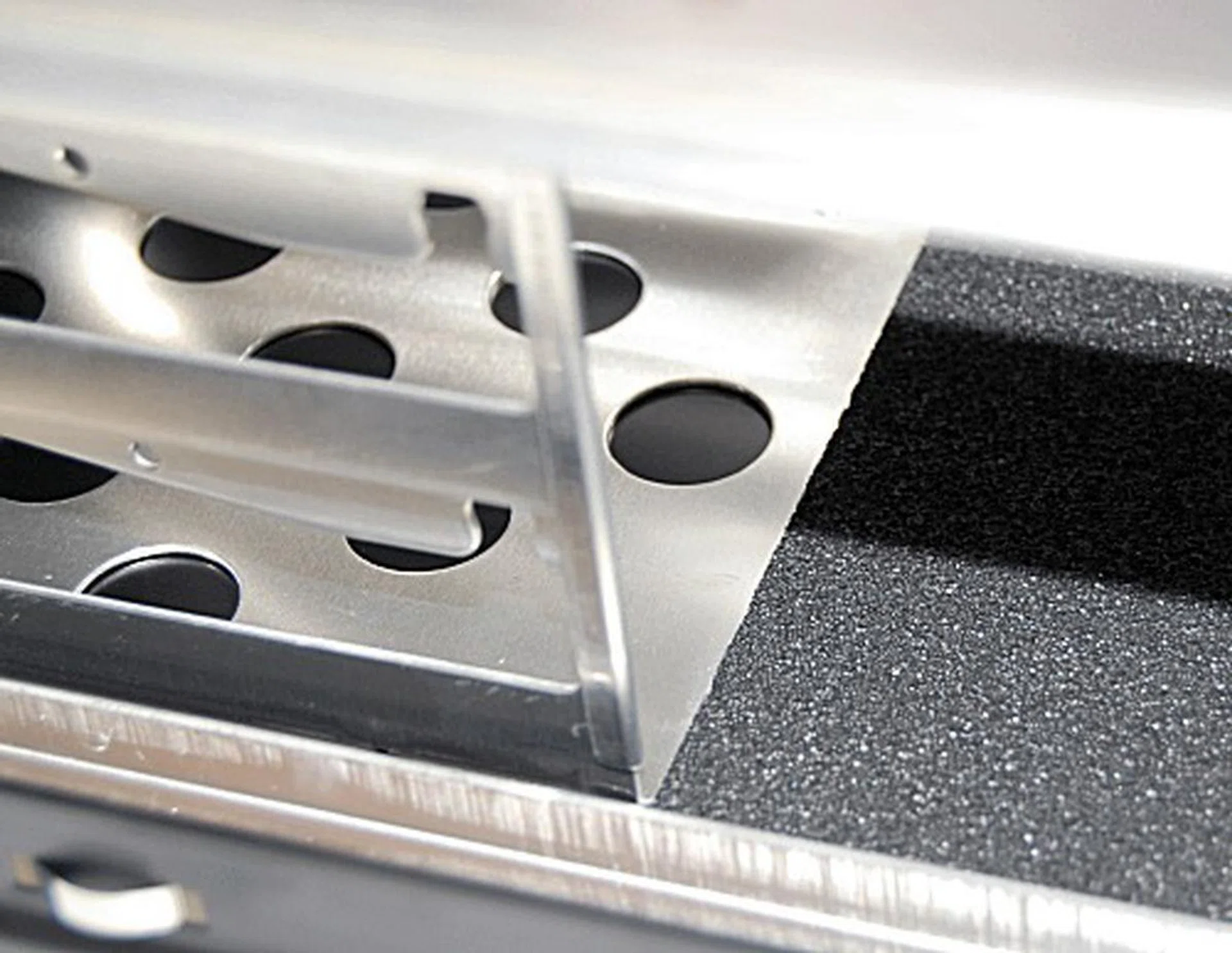 The material hindered the removal of the top HDD cage somewhat and we were afraid of damaging the material by forcibly removing the cage. Note that our review unit is an early engineering build, so this problem may be rectified upon release. Alternatively, you can remove the entire roof, though there's plenty of space to install the HDD drives without even removing the cage.
