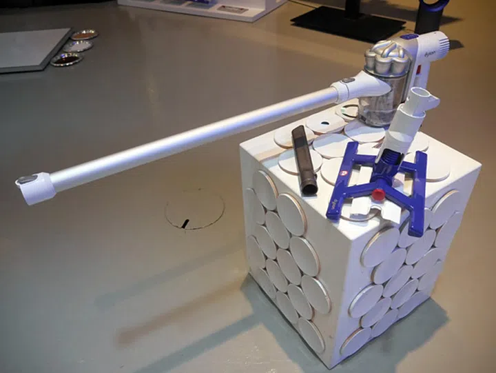 The new Dyson Hard vacuum cleaner with its new head, which can serve as vacuum and mop in one.
