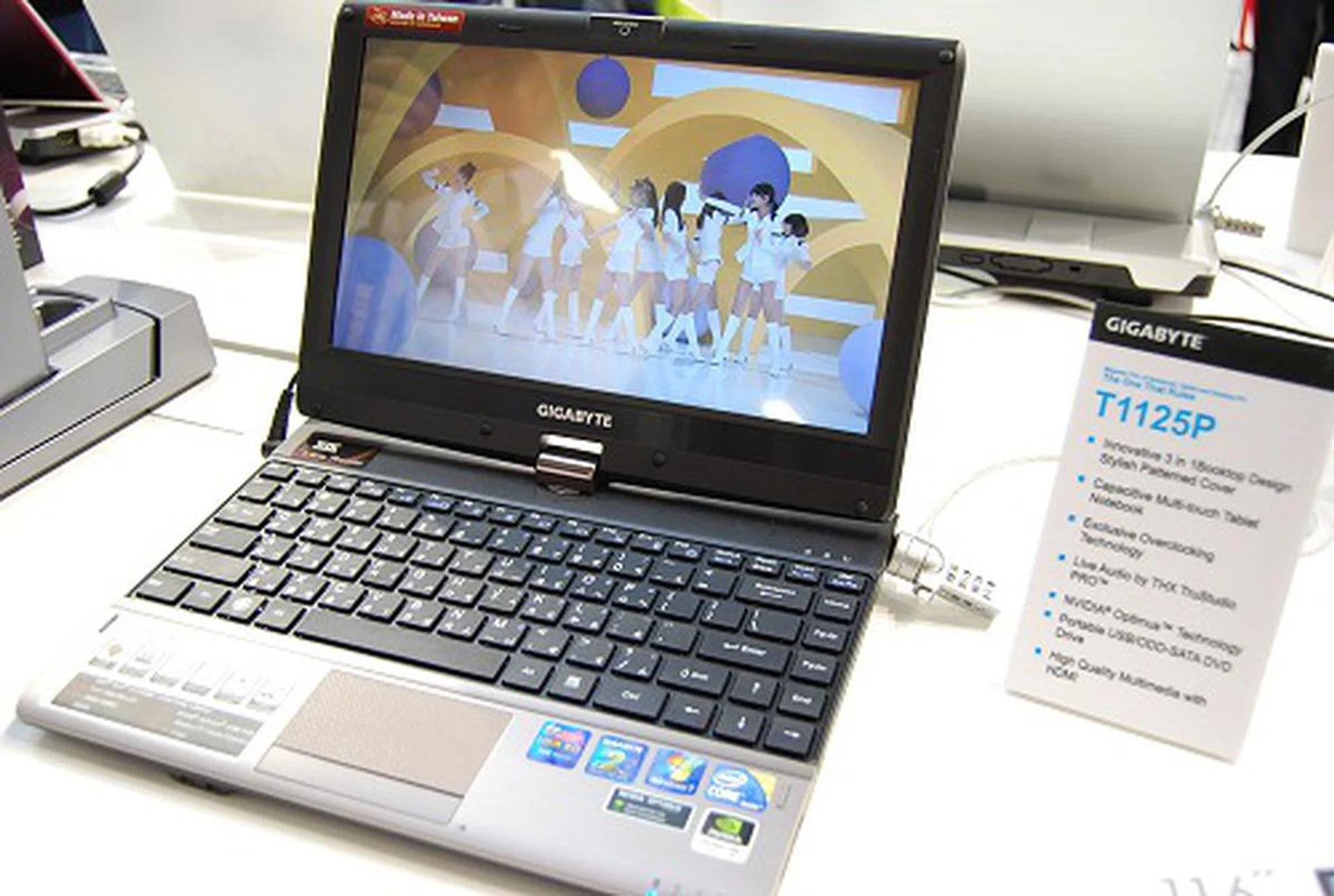 Meet the Gigabyte T1125, a 11.6-inch multi-touch capacitive screen equipped notebook that doubles up as a tablet and a desktop. Powered by low voltage first generation Intel Core processors, it also comes with dual graphics from Intel and NVIDIA, supplemented by NVIDIA's Optimus technology. While the screen swivels to give you a tablet-like usage model, the notebook comes with a rotatable docking station that converts it into a desktop too. Gigabyte calls it the world's first 3-in-1 computer.