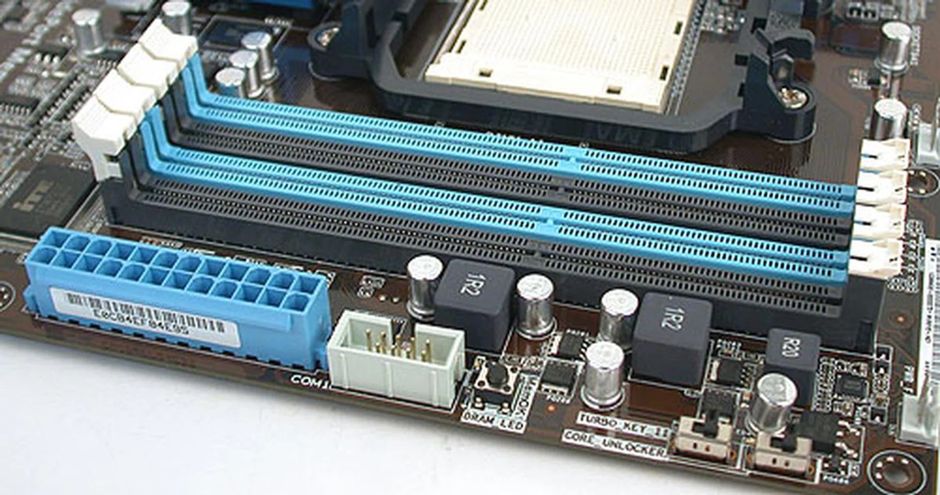 ASUS' unique single latch mechanism for the DIMM slots has yet to be copied by other brands, though in this case, we really don't see any need to use it since there's ample room on this board.
