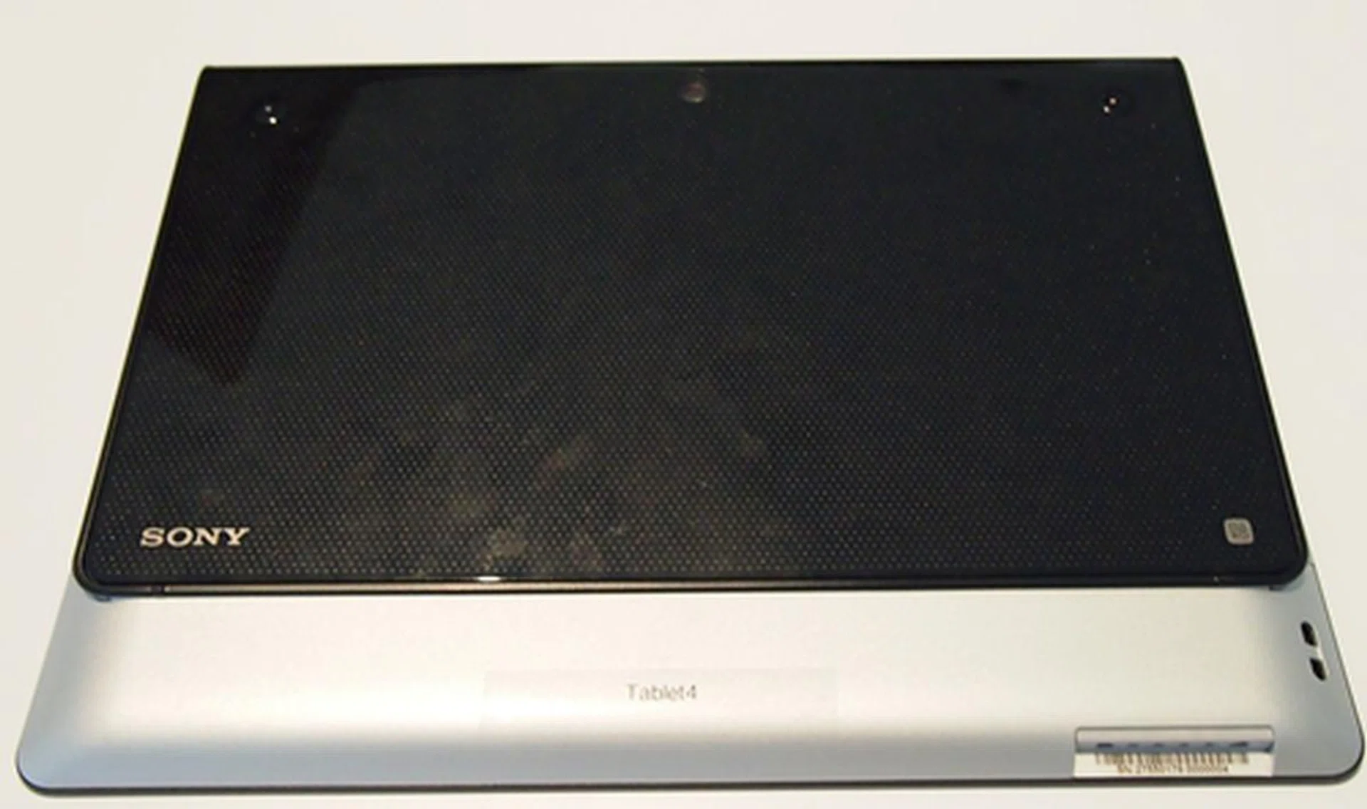 The Sony Tablet S has a textured back, which helps in having a better grip of the device. However, the matte surface is also a fingerprint magnet. You can also find a 5-megapixel camera that is powered by Exmor for Mobile at the top middle section.