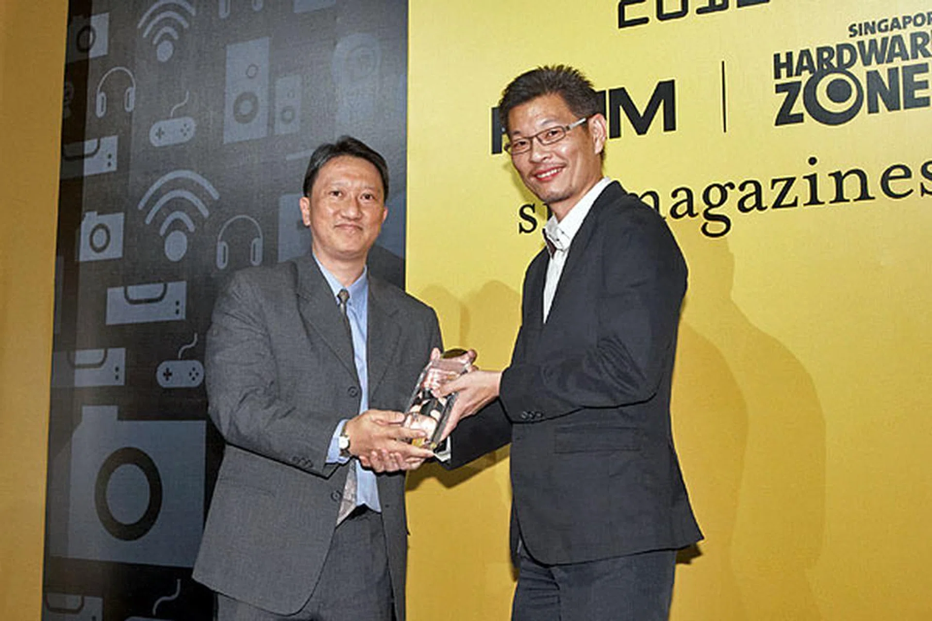 Oki won the Editor's Choice award for Best SOHO Color LED MFP. On stage receiving the award was Mr. Cheang Mun Pun, Business Manager for Singapore, Oki.
