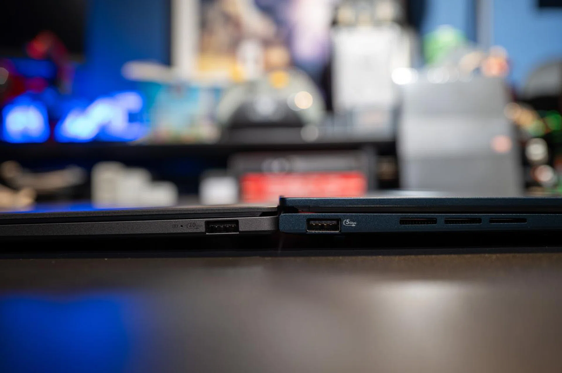 Incredibly, ASUS managed to shrink the Zenbook S 14 without sacrificing any ports. On the right is the older Zenbook 14 OLED. PHOTO: HWZ