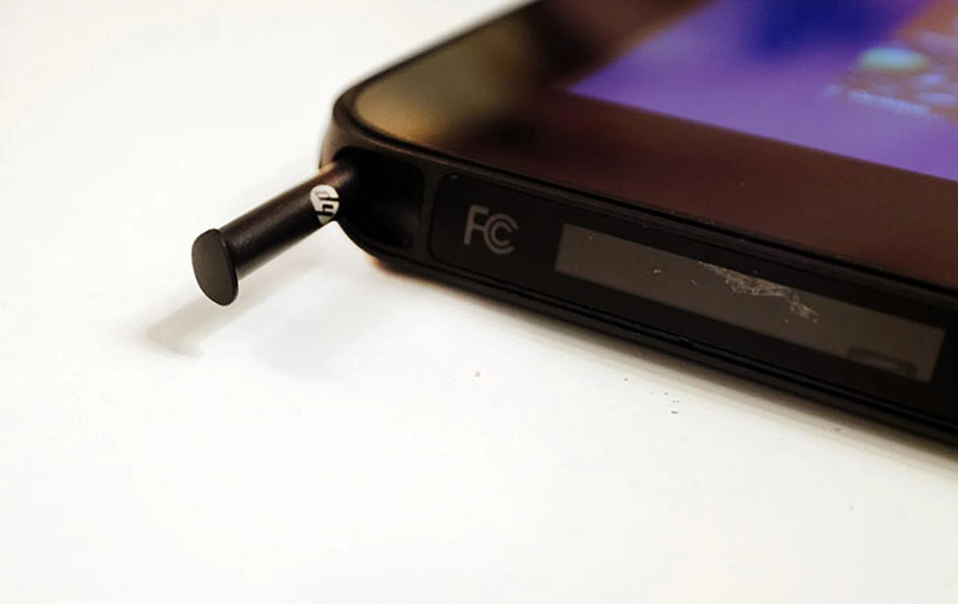 The stylus slot is located on the lower edge of the tablet, which can make it a bit hard to access with one of the keyboard peripherals connected.