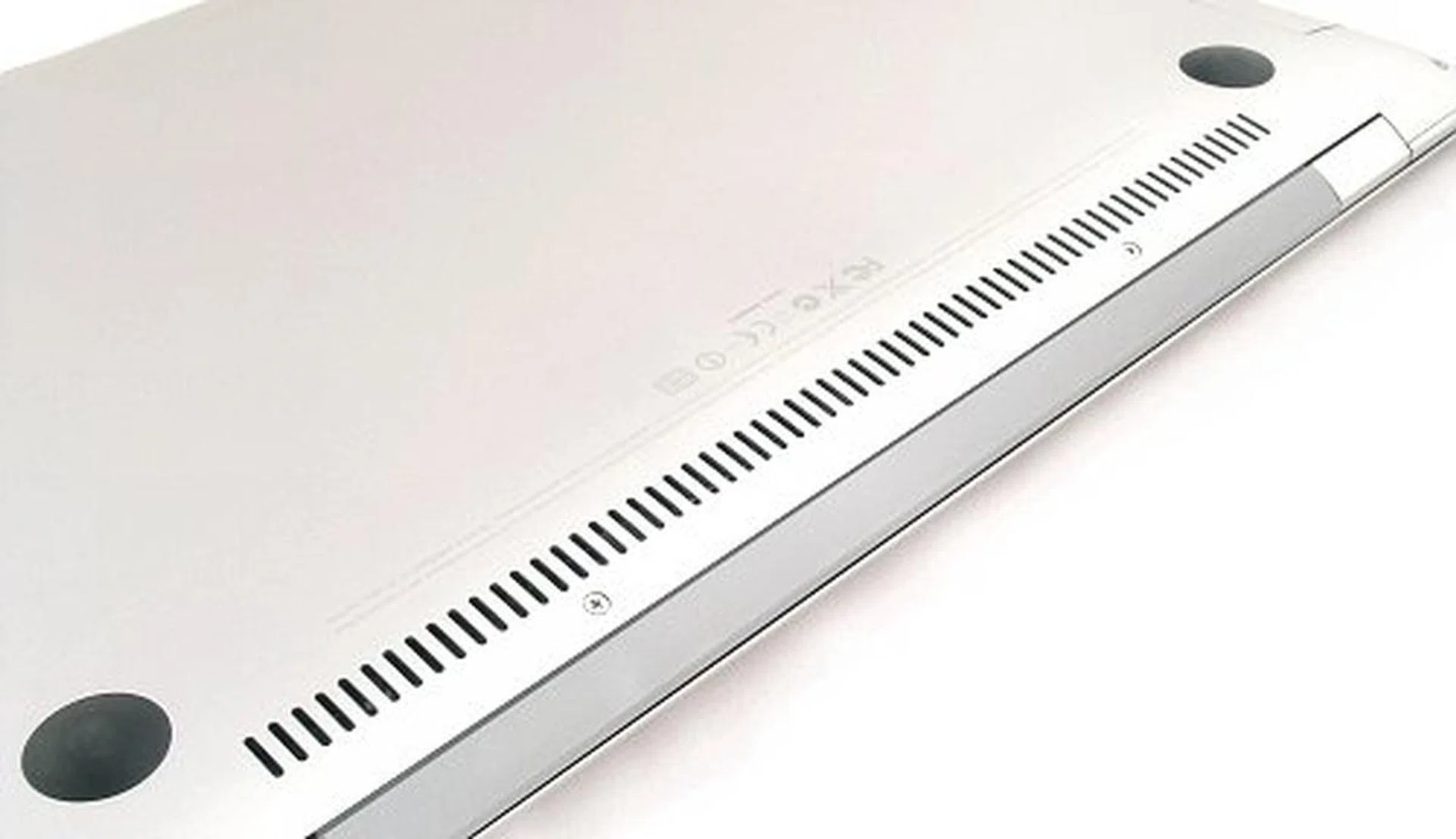 No removable batteries anywhere, the vent here is for CPU cooling.