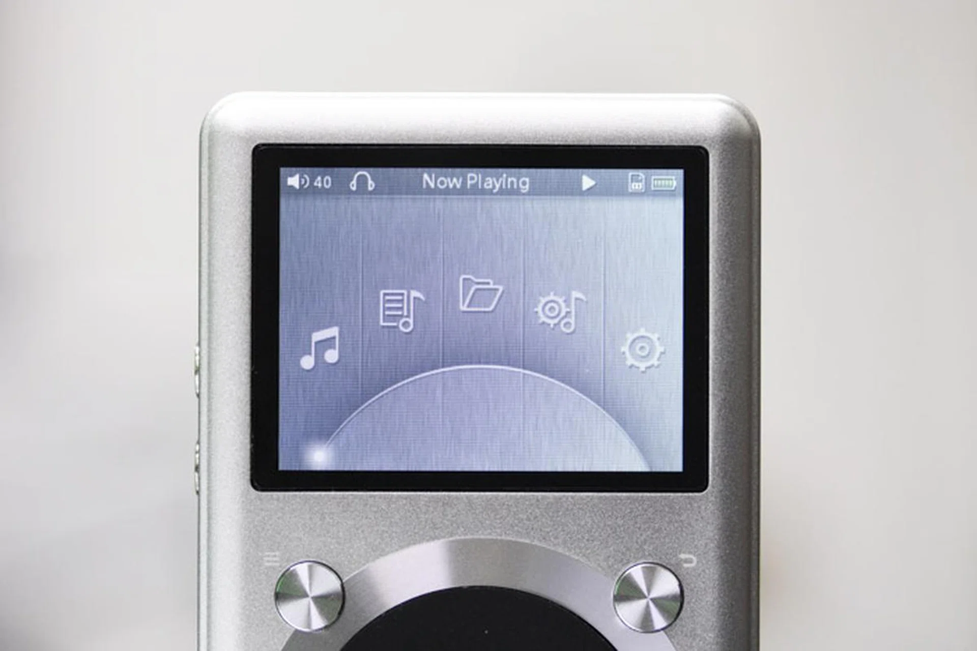 The simple interface lets you jump to what's playing, browse by category, or view the files in a directory structure.