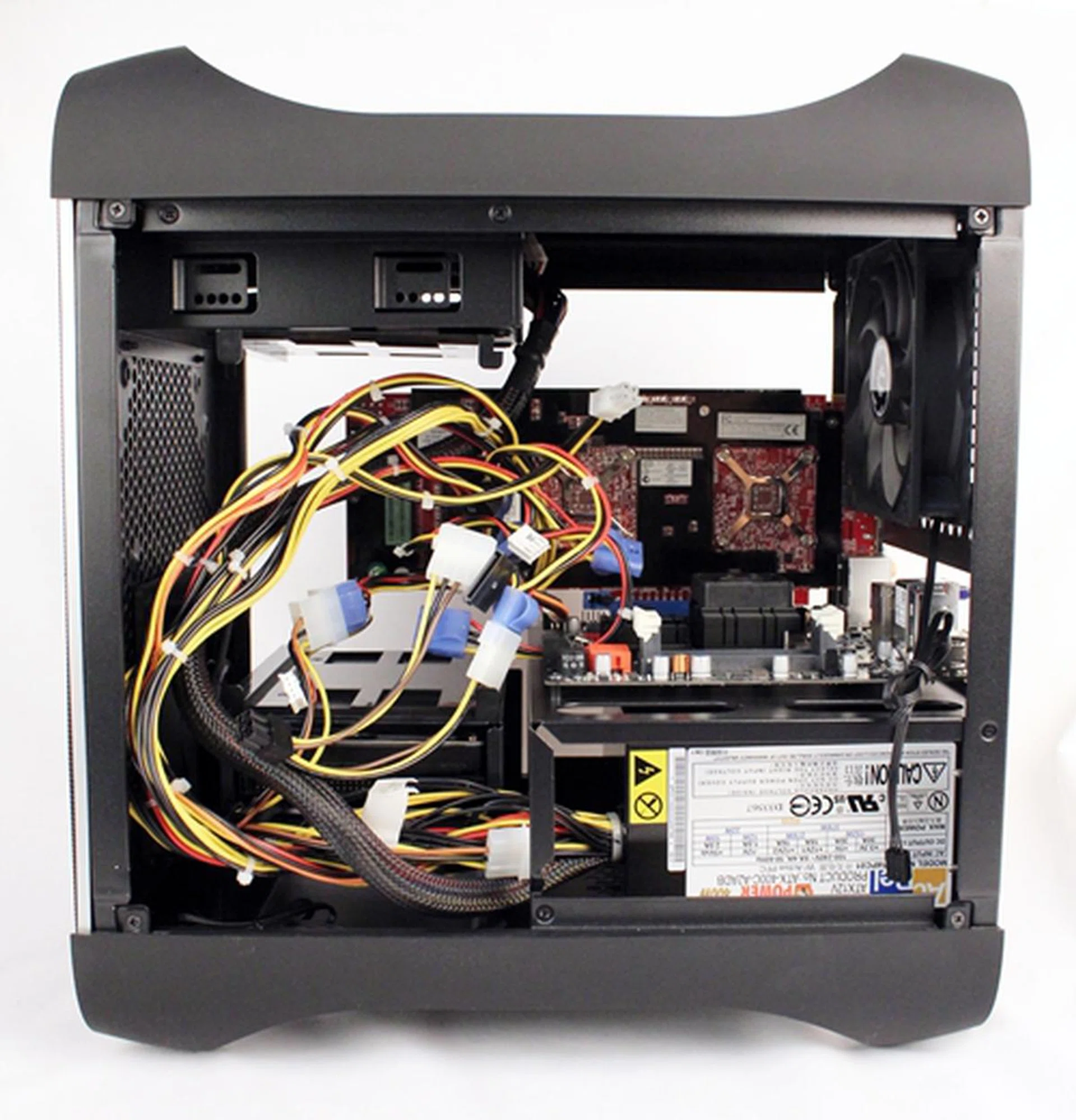 The mess of cables is revealed behind.