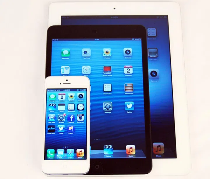 Seen here are the Apple iPhone 5, iPad Mini and the first gen-iPad.