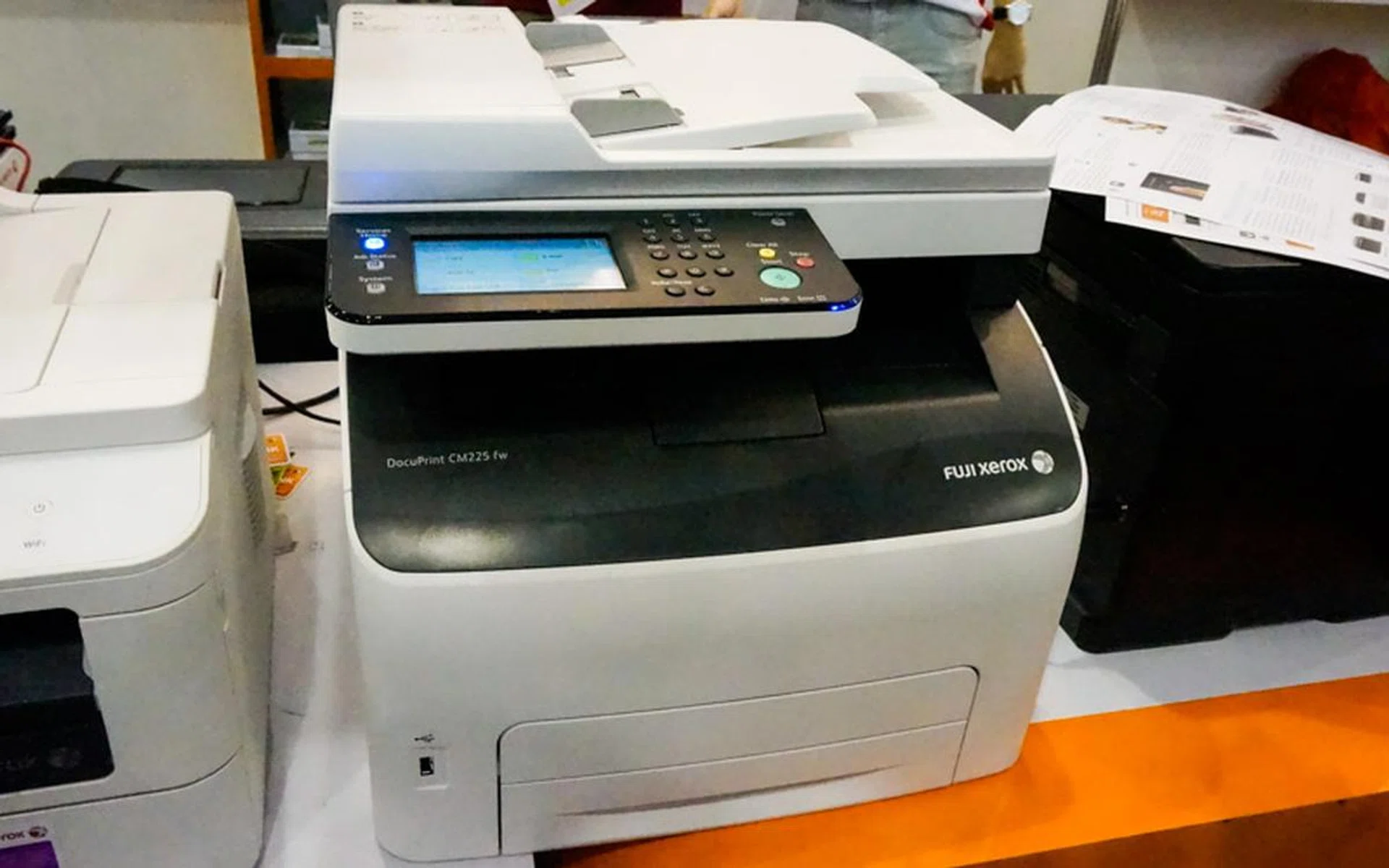 The DocuPrint CM225 fw is an A4 Color Multifunction S-LED Printer that does Print/Scan/Copy/Fax. It has a print speed of 18ppm in both mono and color, and is both network and Wi-Fi ready. It comes with 3-year on-site warranty with drum coverage and is going for $499 with $80 worth of Fairprice vouchers and a free trolley.