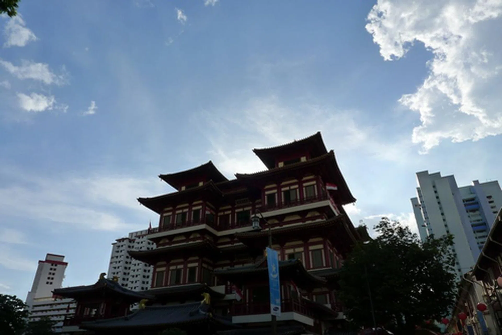 The LX5 manages to retain detail in both the bright sky above and the building in shadow below in this very backlit shot. Impressive. And the wide lens adds some drama, don't you think?