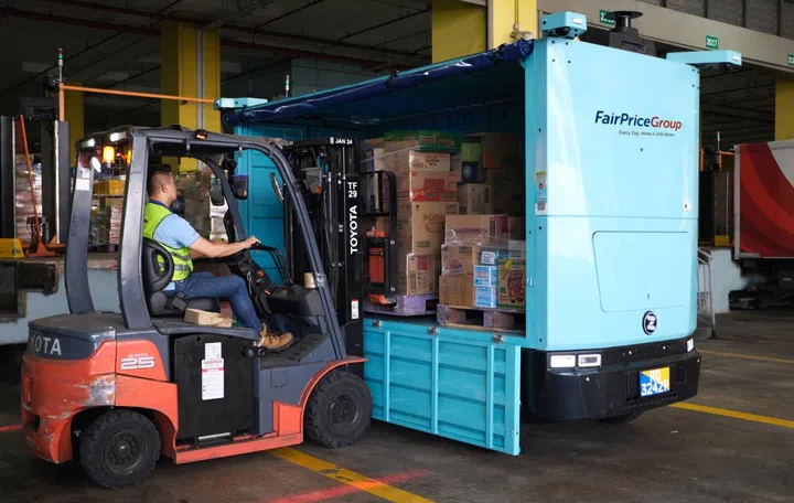 Loading goods onto the Zelos Z10 at Fairprice Group's Benoi distribution centre. Photo: Fairprice Group