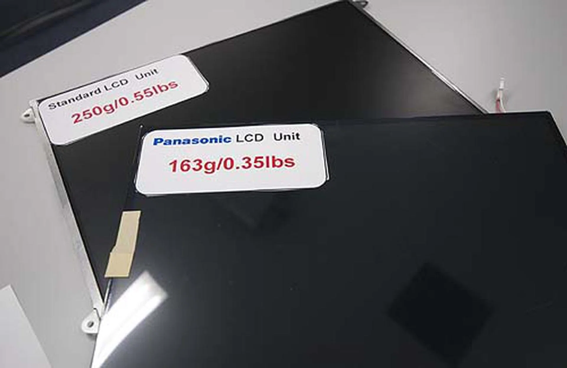 Note the weight savings of the LCD unit as Panasonic used a different mounting and backing to achieve this.