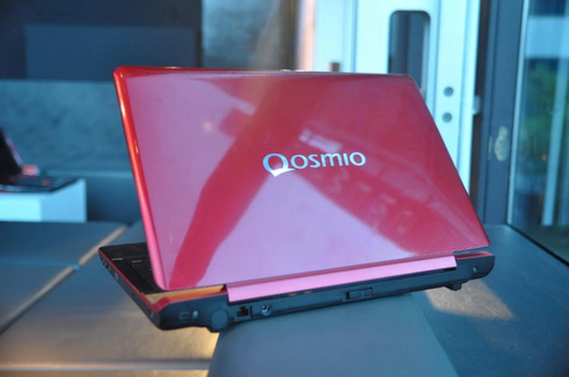 Power and LAN ports are found at the back. The battery release latch is also there.