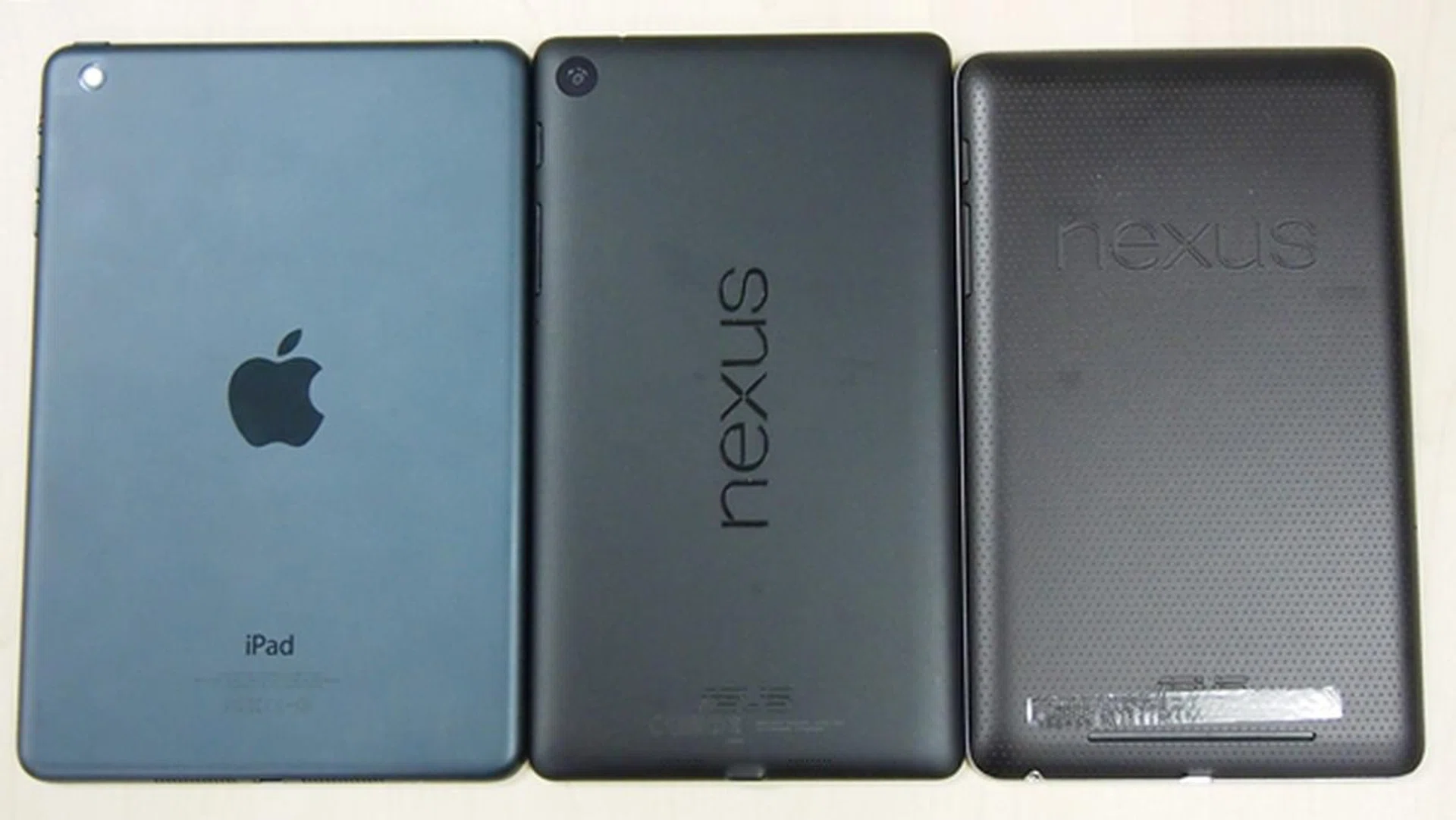 The Nexus 7 (2013) looks more premium and sleeker than its predecessor (right). The Apple iPad mini is still the champ when it comes to build quality and looks.