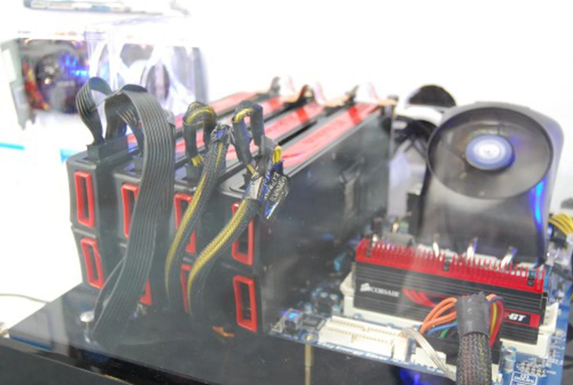 It's actually a Phenom II X6 processor on the 890FXA-UD7 motherboard with four Radeon HD 5870 graphics cards run in CrossFireX, each with 2GB of memory. Mind boggling.