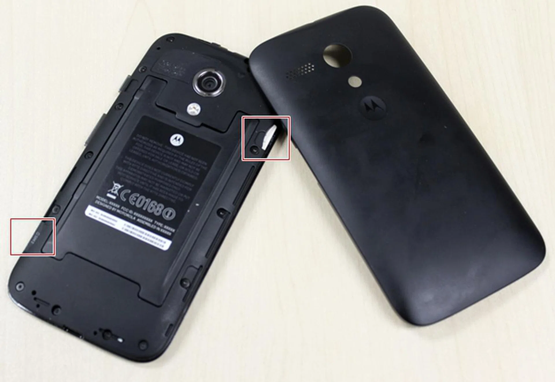 Removing the rear cover will let you access the two SIM card slots in the Moto G.