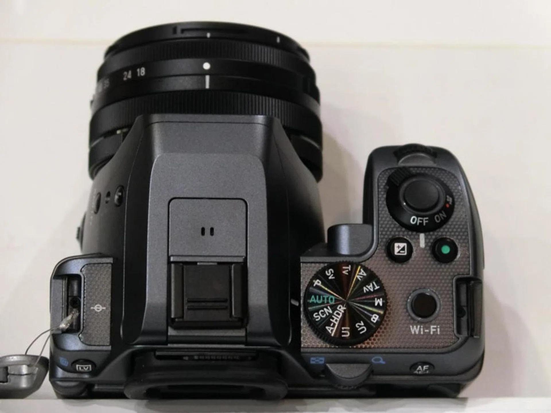 From the top you can see that there remains a sizable handgrip on the K-S2.