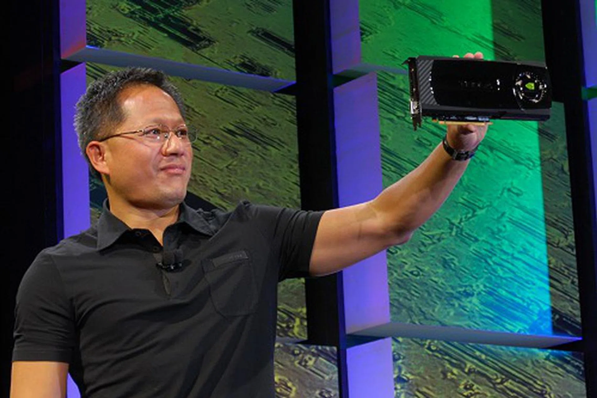 NVIDIA CEO Jen-Hsun Huang shows off the company's latest and most advanced GPU yet.
