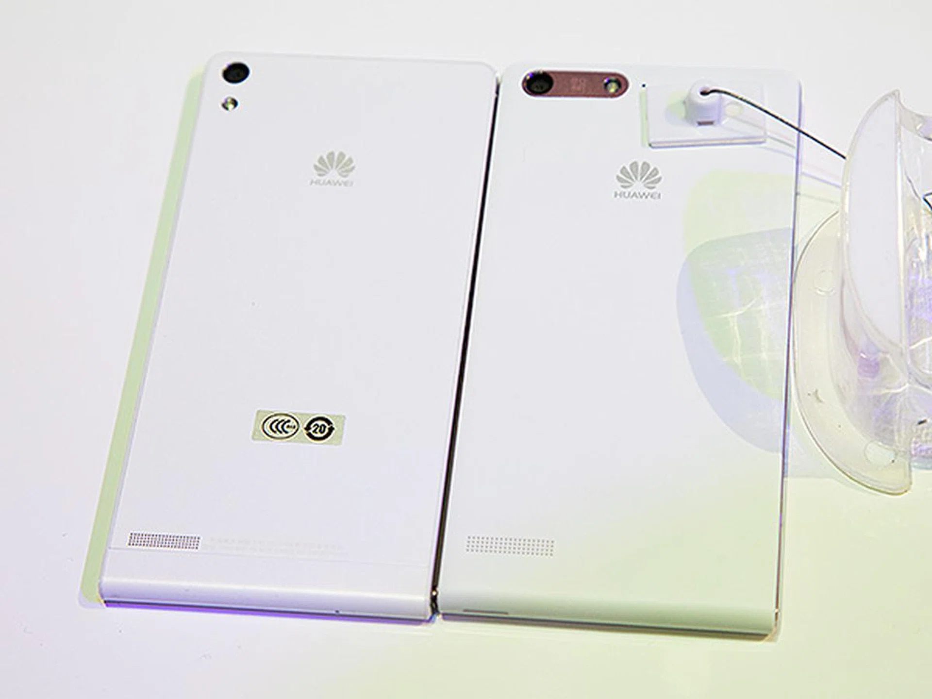 The back of the Ascend P6 (left) and the Ascend G6 (left). Although the rrangement of the camera and flash unit are different, the audio port remains in the same location.