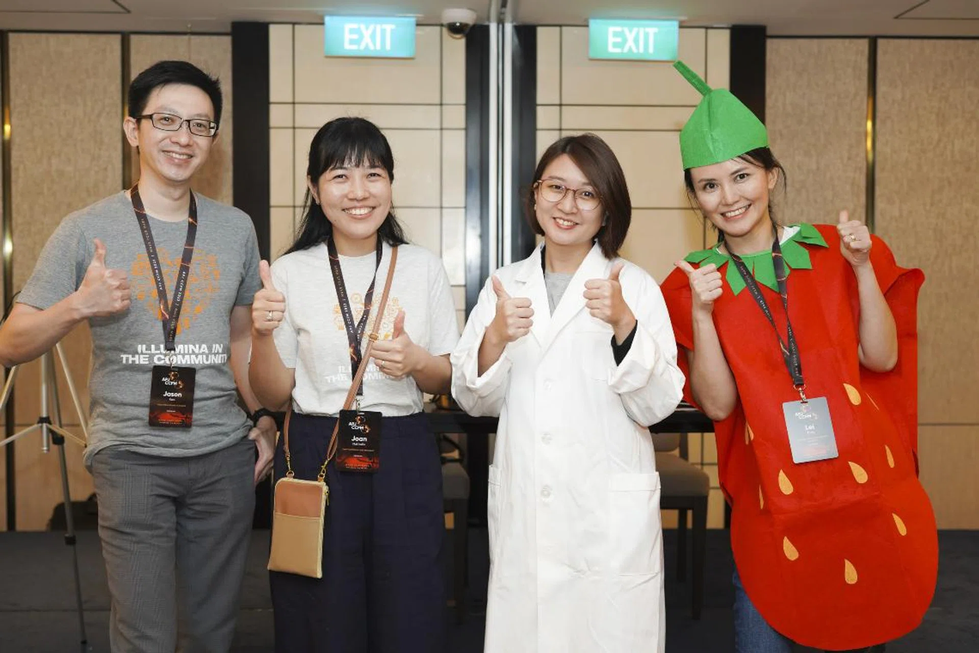 Illumina employee volunteers dressed up as a scientist and strawberry for the Strawberry DNA extraction experiment with primary school students from Children’s Wishing Well. Image source: Illumina.