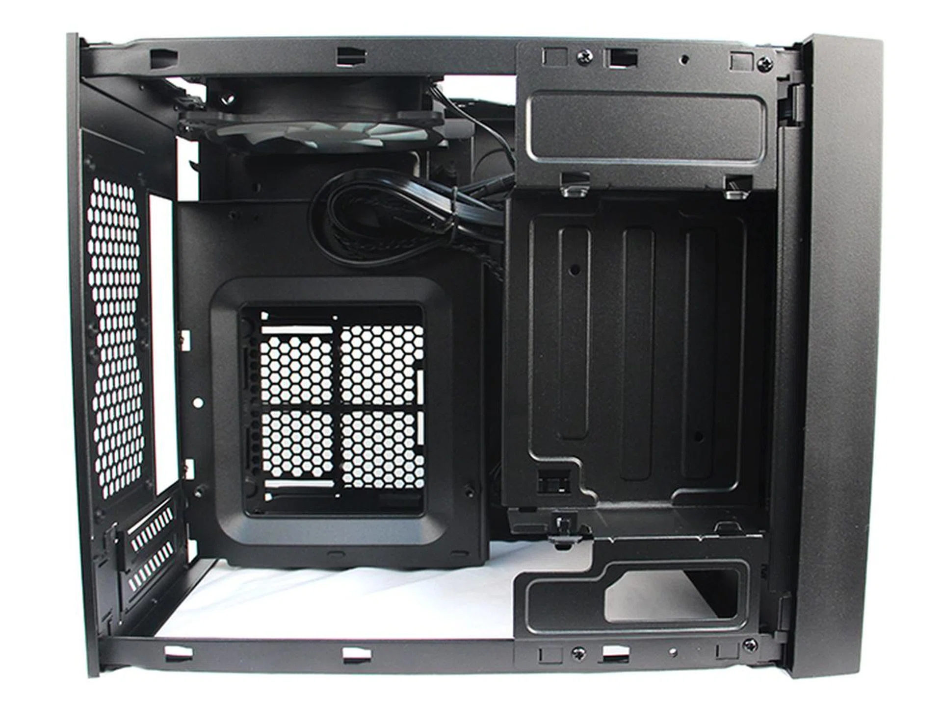 The insides of the Obsidian Series 250D can be divided into two levels. The top level houses the motherboard tray and 5.25-inch external drive bay, while the bottom is where the PSU bay and HDD cage sit.
