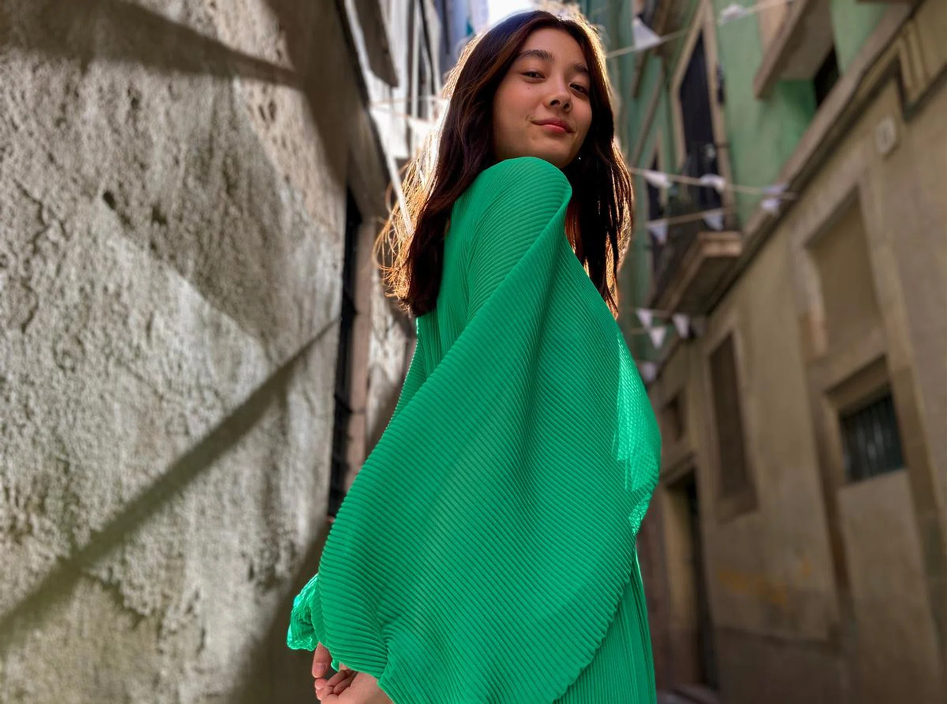 Since I can't go out and shoot photos now, this sample image from Apple will have to do. Here, we can see the subject being relighted against bright backlight. (Image source: Apple)