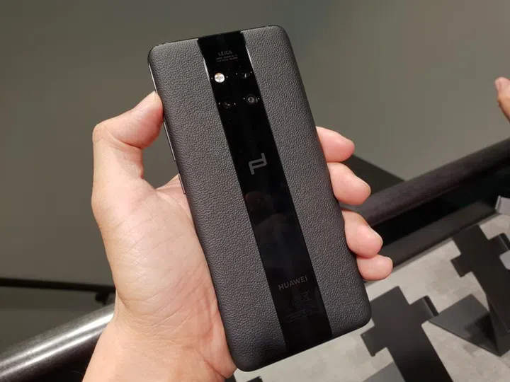 Genuine, handcrafted leather to each side. Glass in the middle.