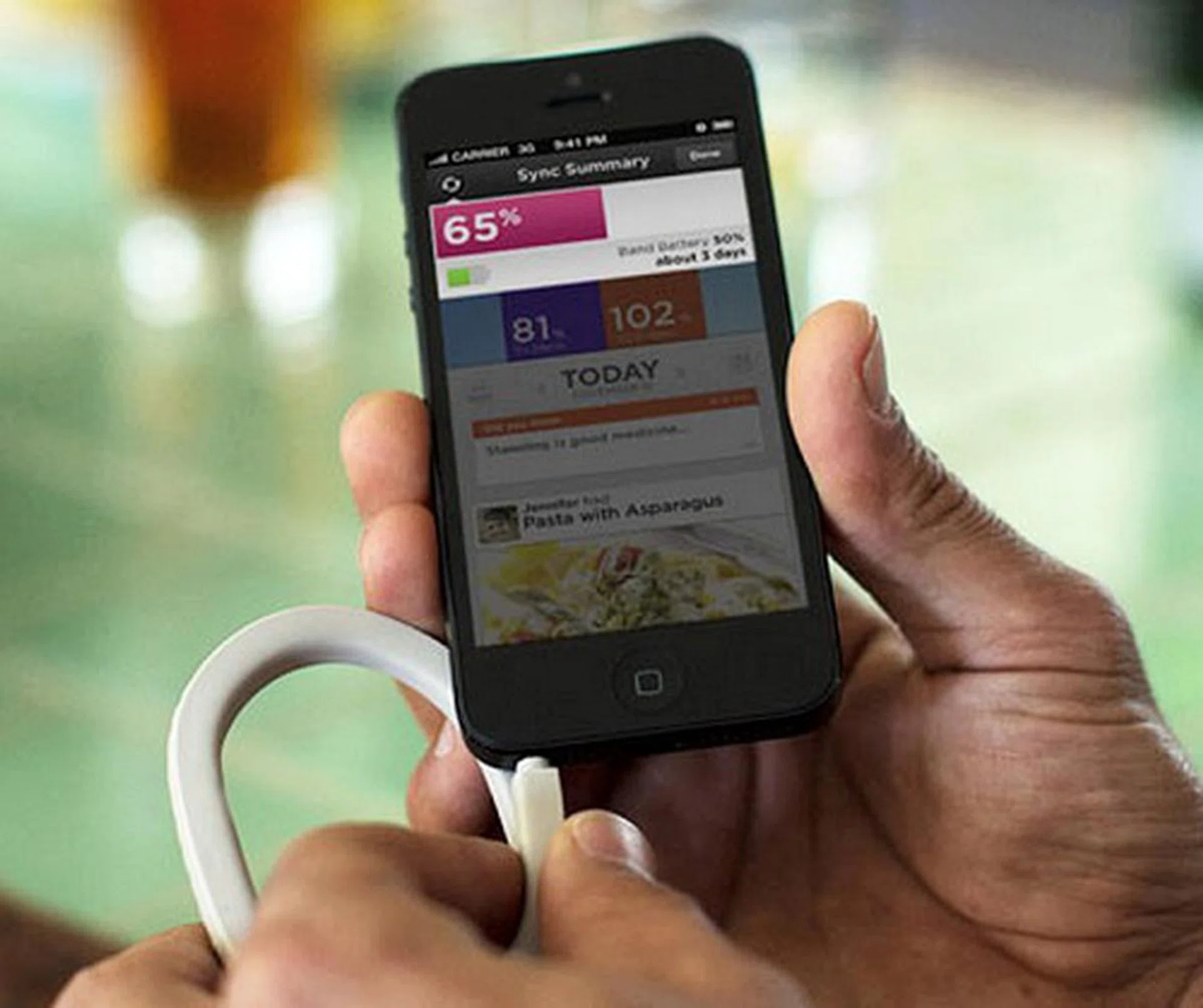 Here you can see the Up being connected to your phone as it relates its quick status and to sync it with the app on the phone. Photo courtesy of Jawbone.