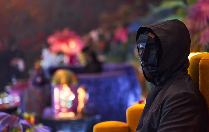 Interestingly, the flower motif seems to be continued in this still of the Front Man. Photo: Netflix