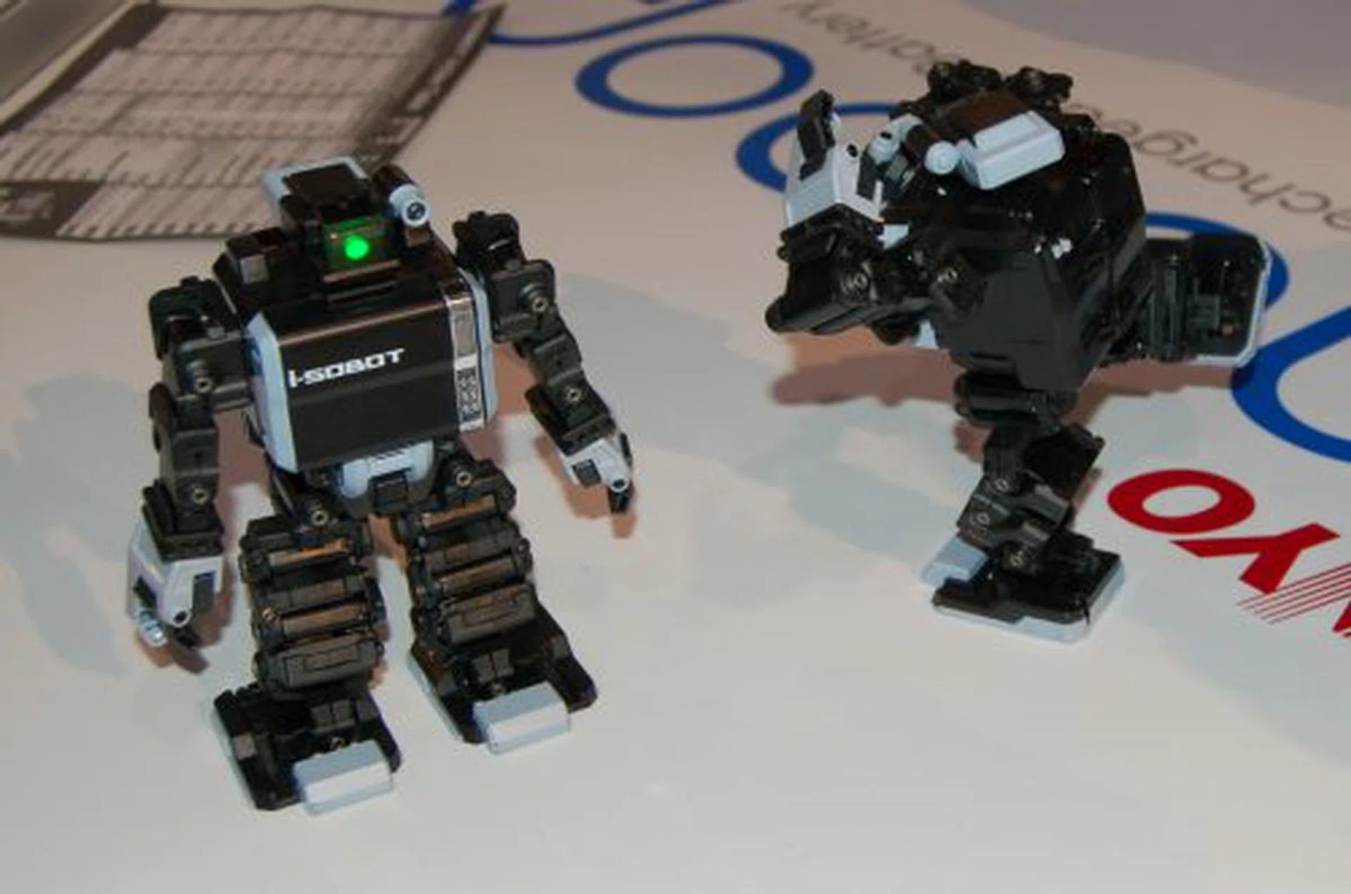  Sanyo showcased what is supposed to be the world's smallest humanoid robot running on eneloop batteries. These guys measure 165mm tall, move with 17-servo engines and can be programmed up to 10 voice commands in addition to their remote control. Robot ninja kick! Haiyaa! Probably great to have around when fighting for the remote.  