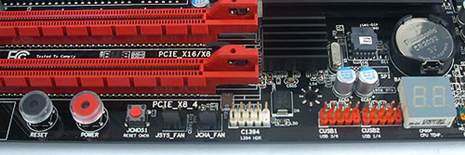 Onboard controls for power, reset and clear CMOS. There's also a debug LED with the debug code printed in the user manual for reference. The headers for USB and FireWire are also found here