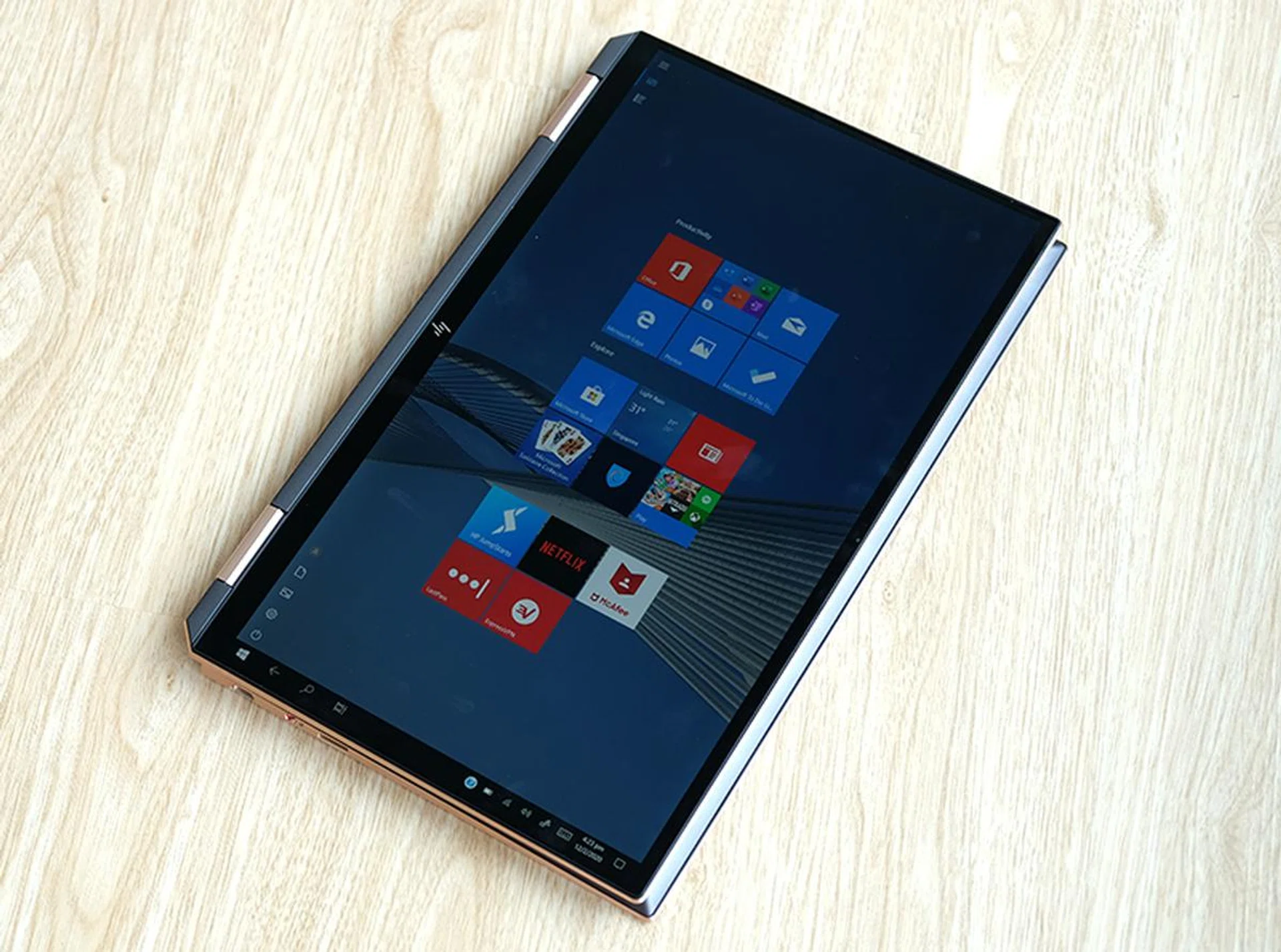 It works well enough in tablet mode but it's still slightly compromised compared to a Surface Pro 7.