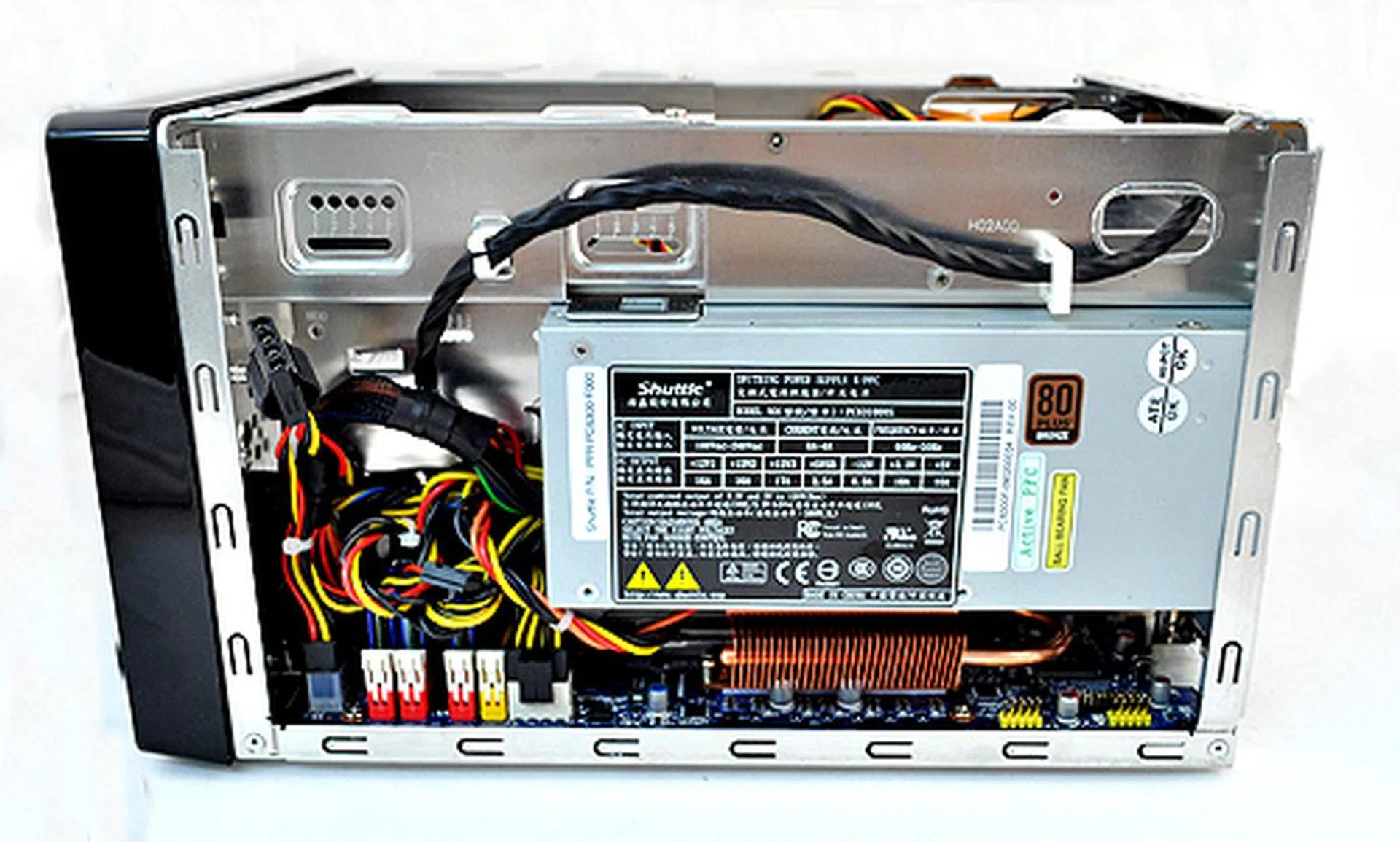 We begin our inspection of the interior with the PSU. It is rated at 500W and has a 80 PLUS Bronze certification. Note that at the bottom right corner, there's also two USB headers.