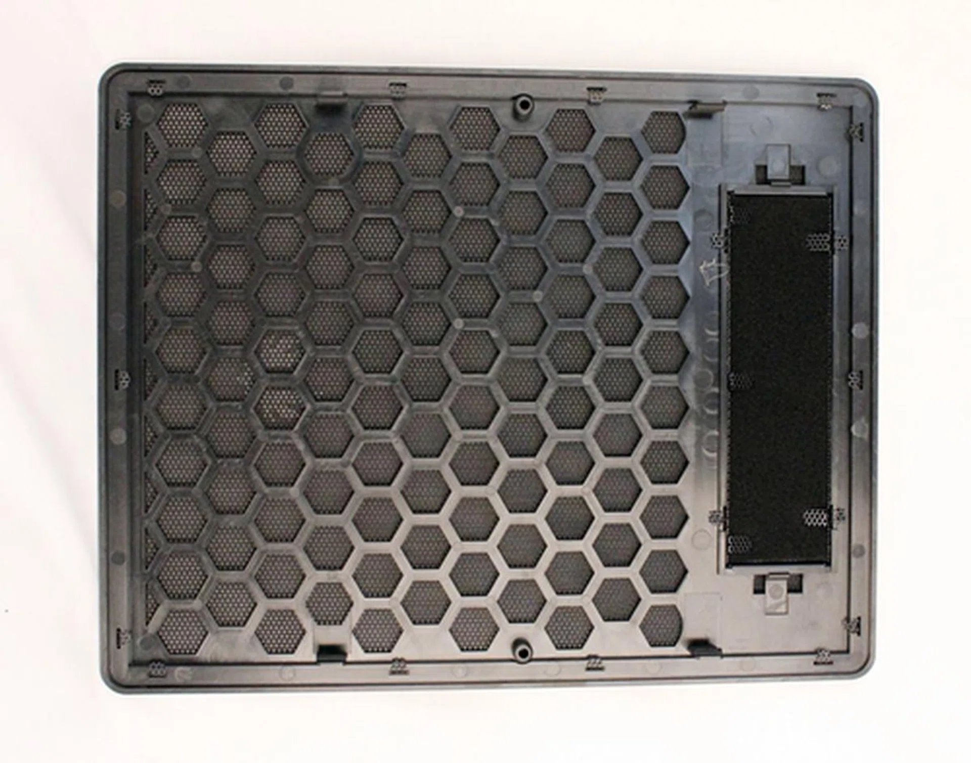 There are numerous hexagon cut-outs for vents and we like the added dust filter for the 5.25-inch drive bay cover to prevent dust for entering the chassis when the drive bay is unused.