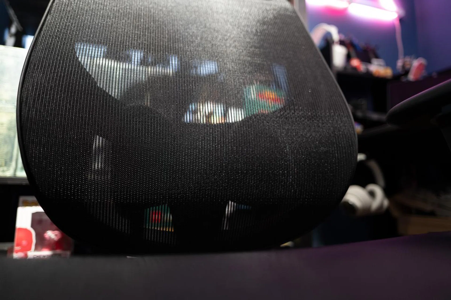 You can almost see the dual kidney-shaped lumbar support behind the mesh - it's also height adjustable.