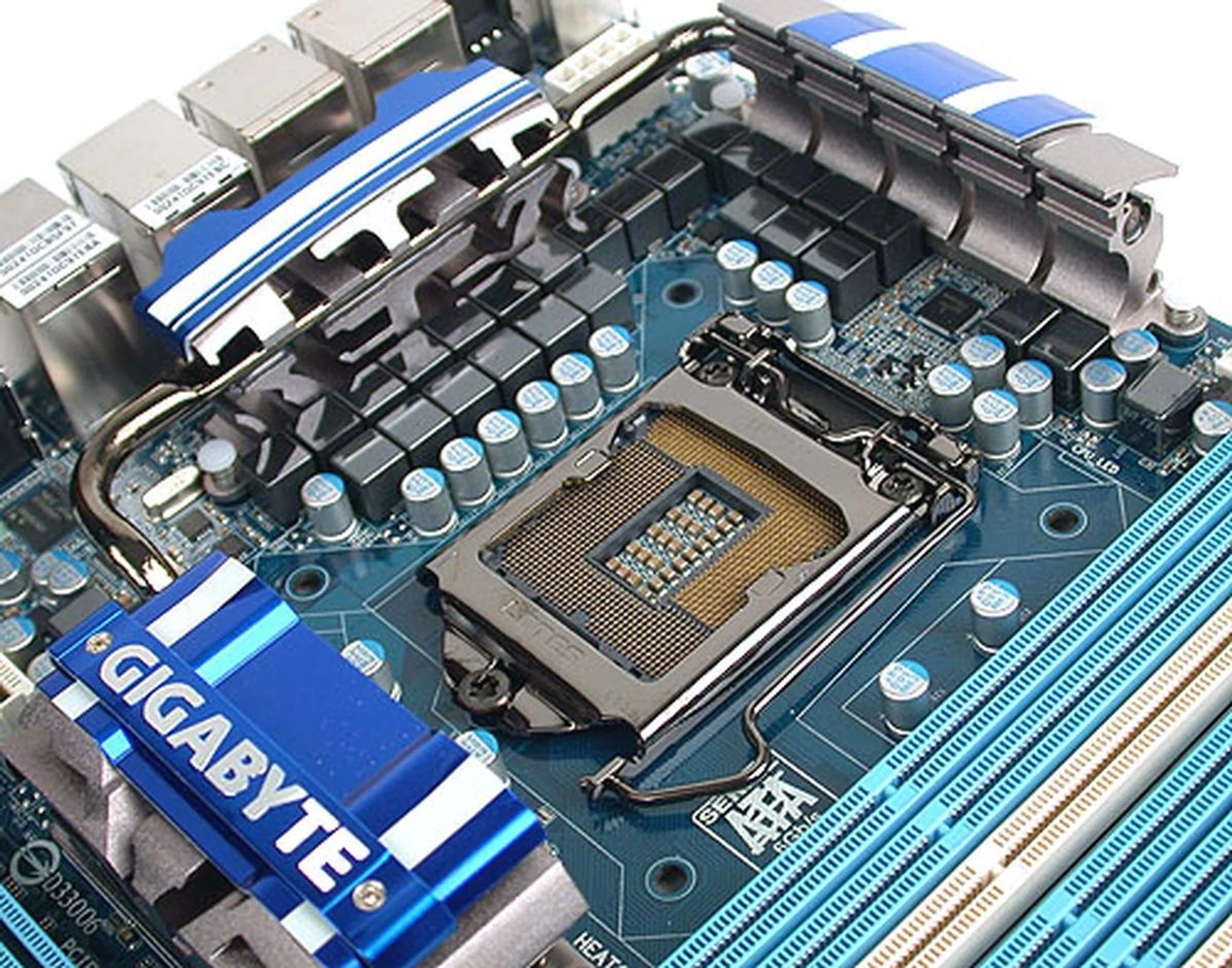 Gigabyte has prettied up this board with some bling. The CPU socket (LOTES) is reflective and polished and this includes the shiny top of the ferrite core chokes. 