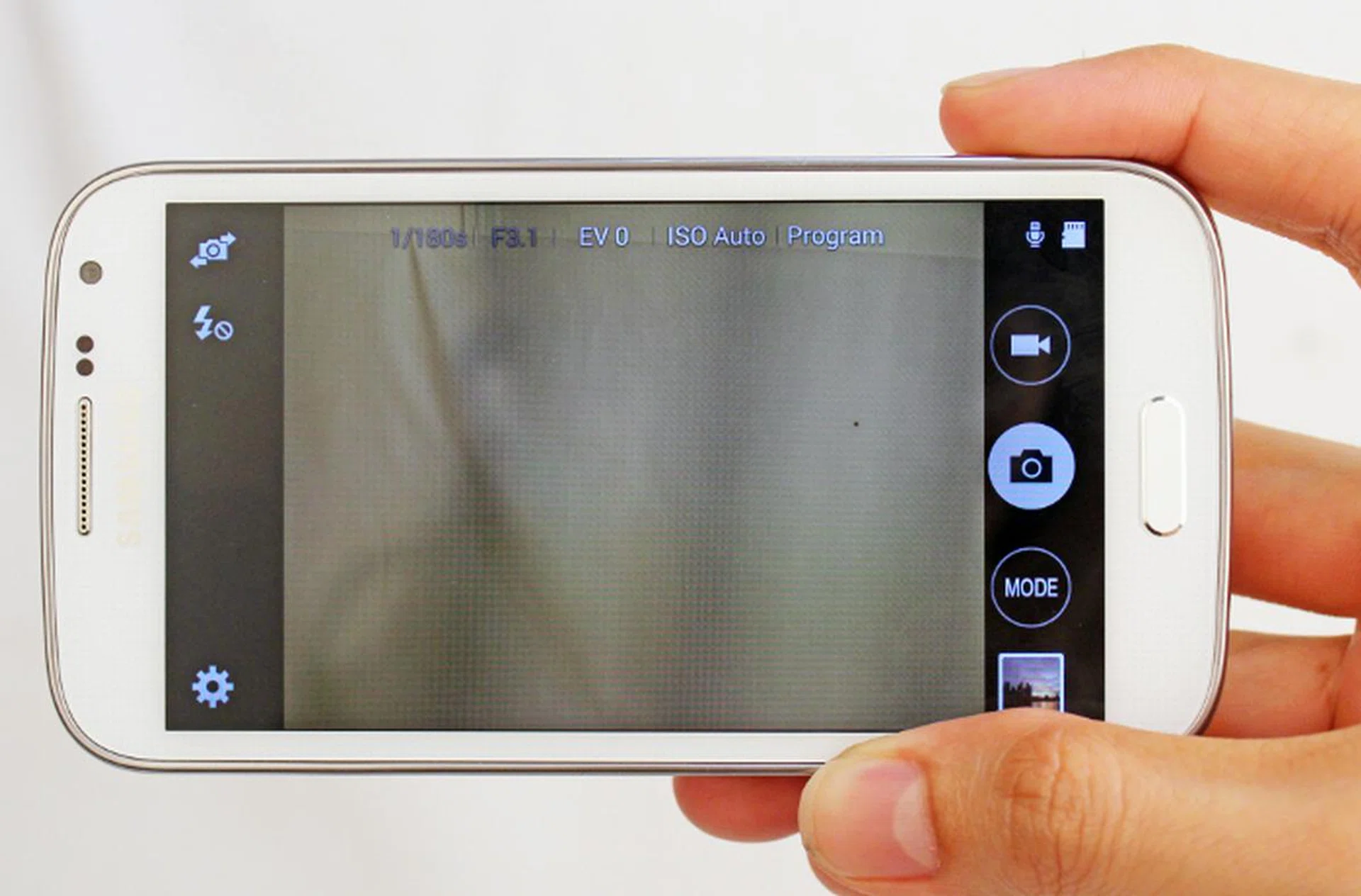 When shooting in landscape orientation, the shutter button will be right below your right index finger.