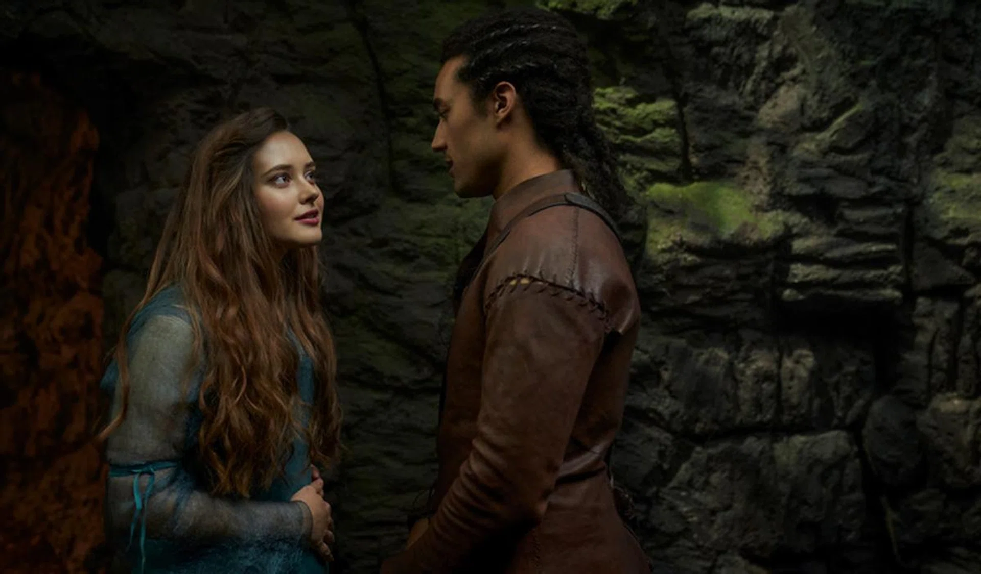 Katherine Langford (left) plays Nimue, while Devon Terrell (right) plays Arthur. | Image: Netflix