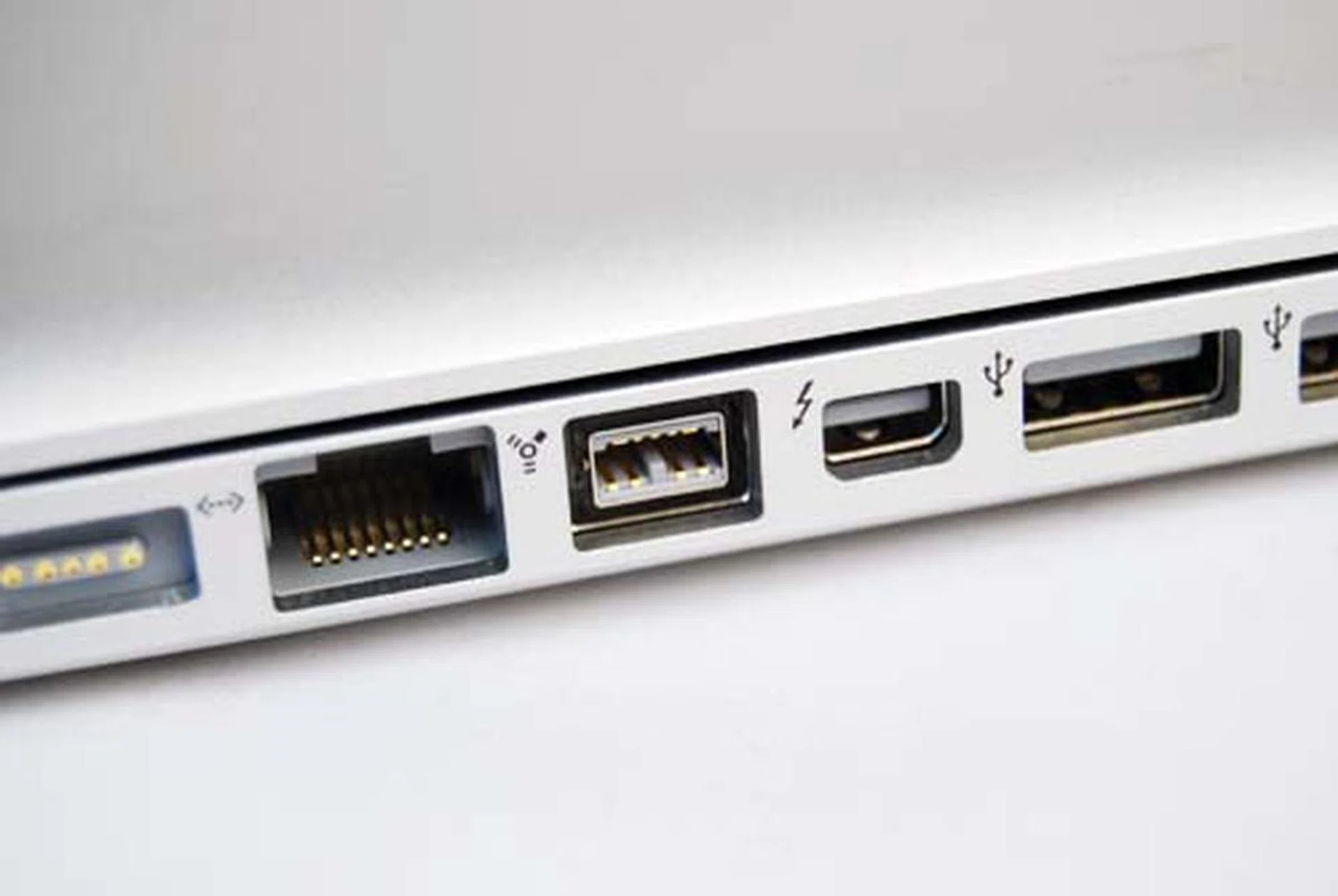 On the left side are ports, including the shiny new Thunderbolt (denoted with a lightning icon). Otherwise you'll find the usual two USB 2.0 ports, the Gigabit ethernet port, a FireWire 800 port, audio input and output and the SDXC card slot (not shown in picture).